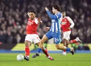 Arsenal Tighten Grip on Premier League Title Race with Gritty Brighton Win