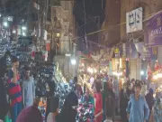 Hyderabad's Historic Resham Gali Bustles with Eid Shoppers During Ramadan