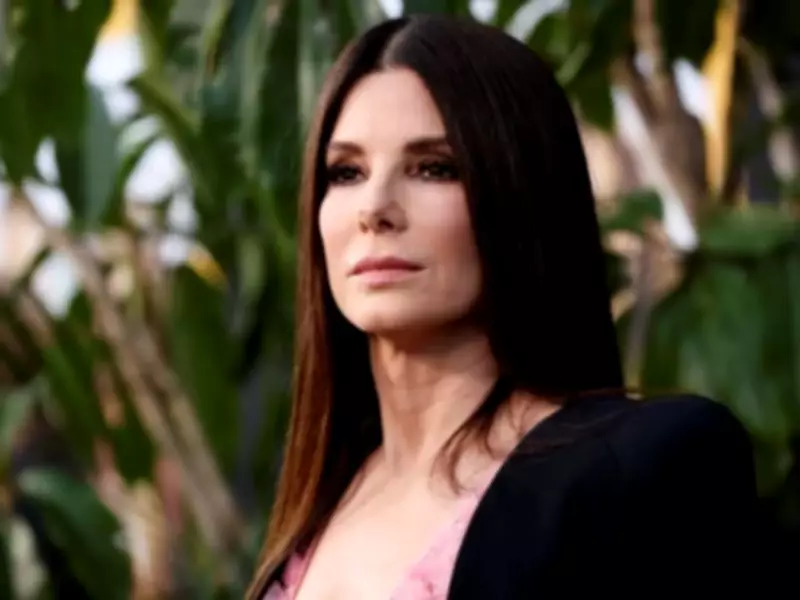 Sandra Bullock on Balancing Motherhood and Filming: 'I'm Raising My Children'
