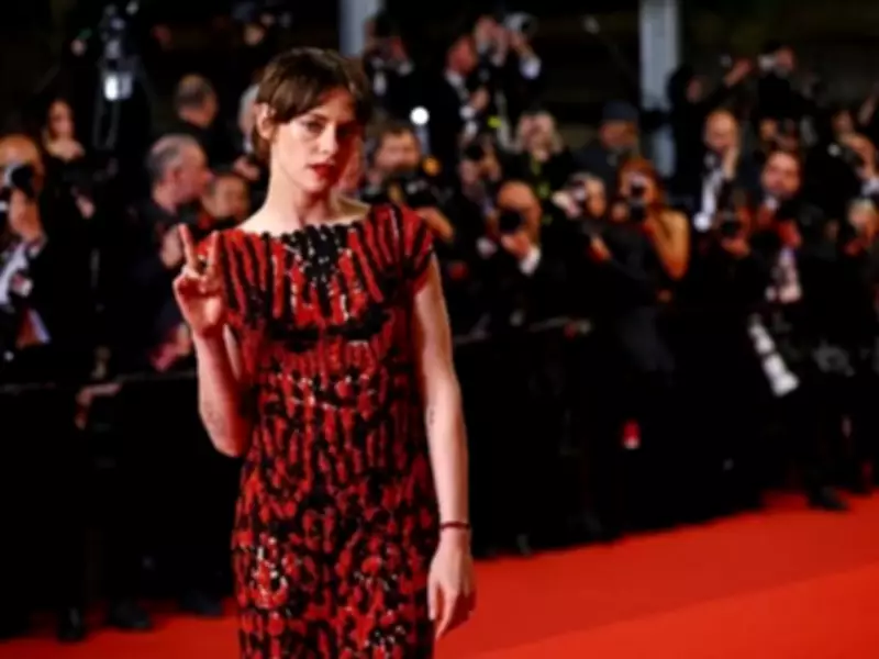 Kristen Stewart Challenges Cannes Dress Code with Sneakers