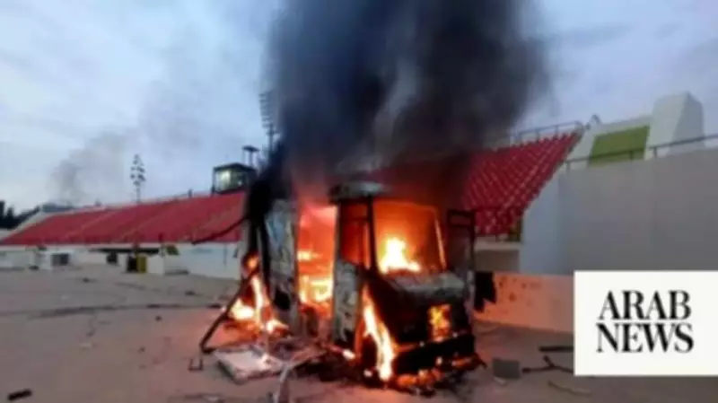 Libyan football fans set GNU building on fire in protest