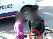Motorcycle Police Squad Collects Eidi at Checkpoint in Pakistan