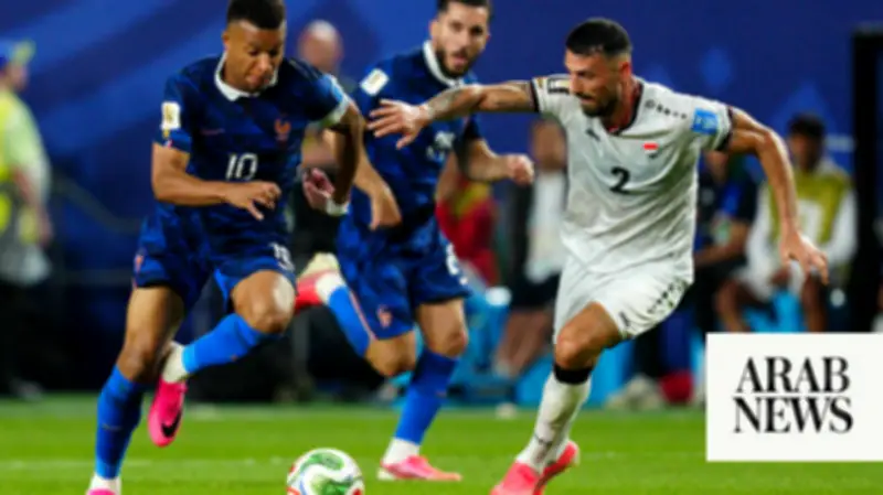 Mbappe double sends France into knockout rounds after weather delay