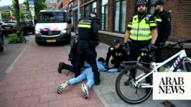 Morocco fans clash with police in The Hague after World Cup win over Netherlands