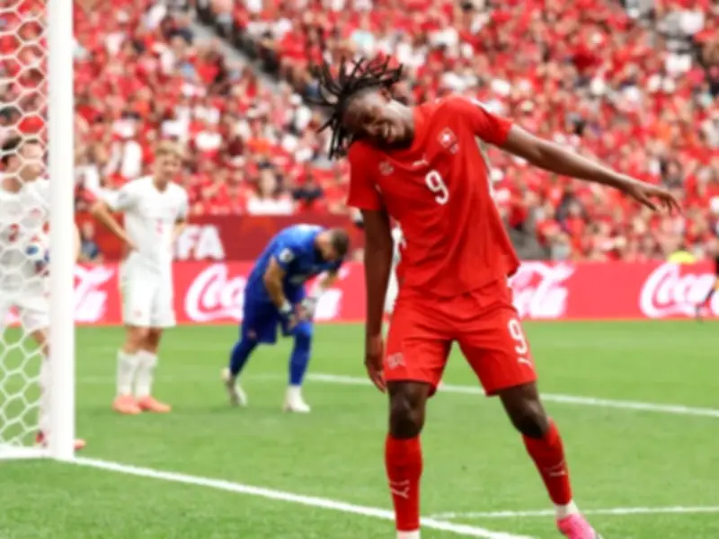Switzerland Beat Canada 2-1 to Top World Cup Group B, Co-Hosts Reach Knockouts First Time