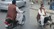 Karachi Motorcyclist Arrested for Indecent Act on Pink Bus