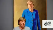 Merkel unveils official portrait for German chancellery