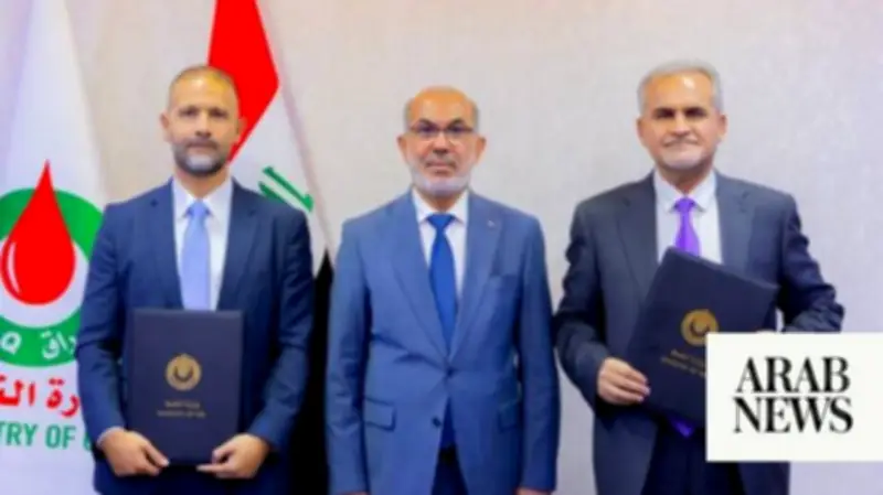 Iraq and Halliburton sign deal to develop two oil fields