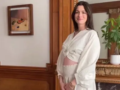 Anne Hathaway Laughs Off Backwards Maternity Outfit Claims